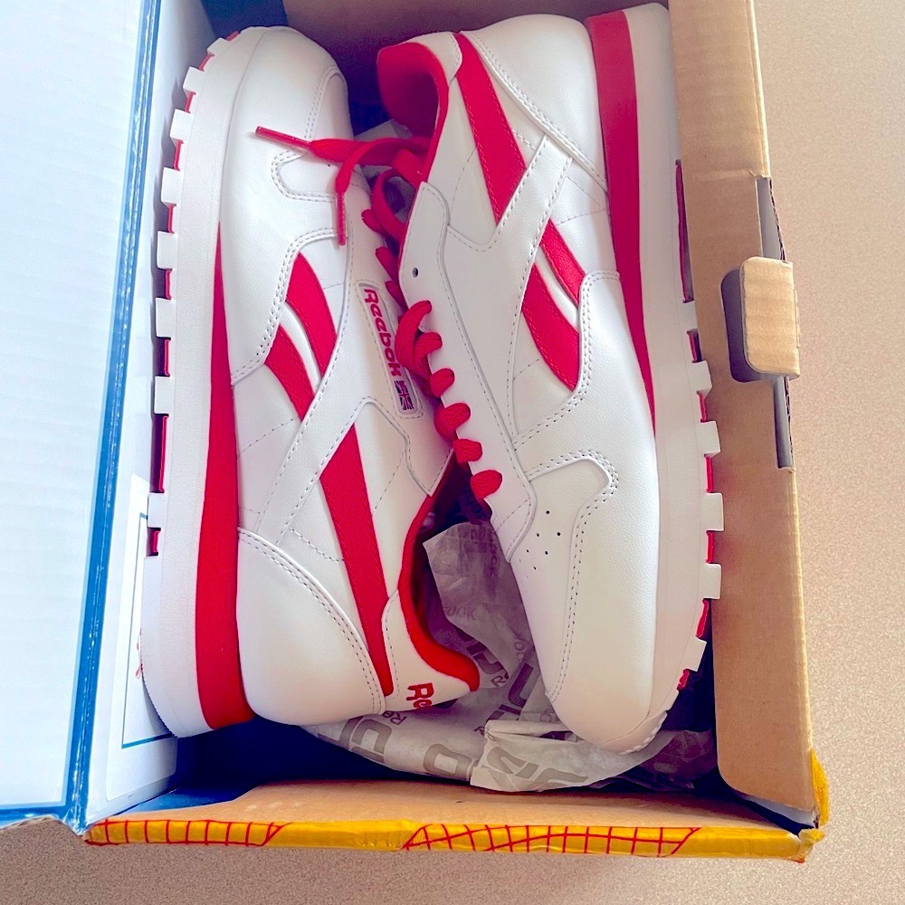 Men’s never worn size 9 red and white Reebok shoes
